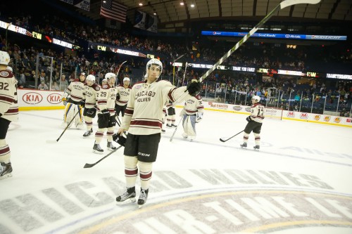 Thank you, Wolves fans. Jordan Schmaltz and his teammates take some time following the 4-2 win to thank the fans for their loyal support all season long. Photo: Ross Dettman/Chicago Wolves